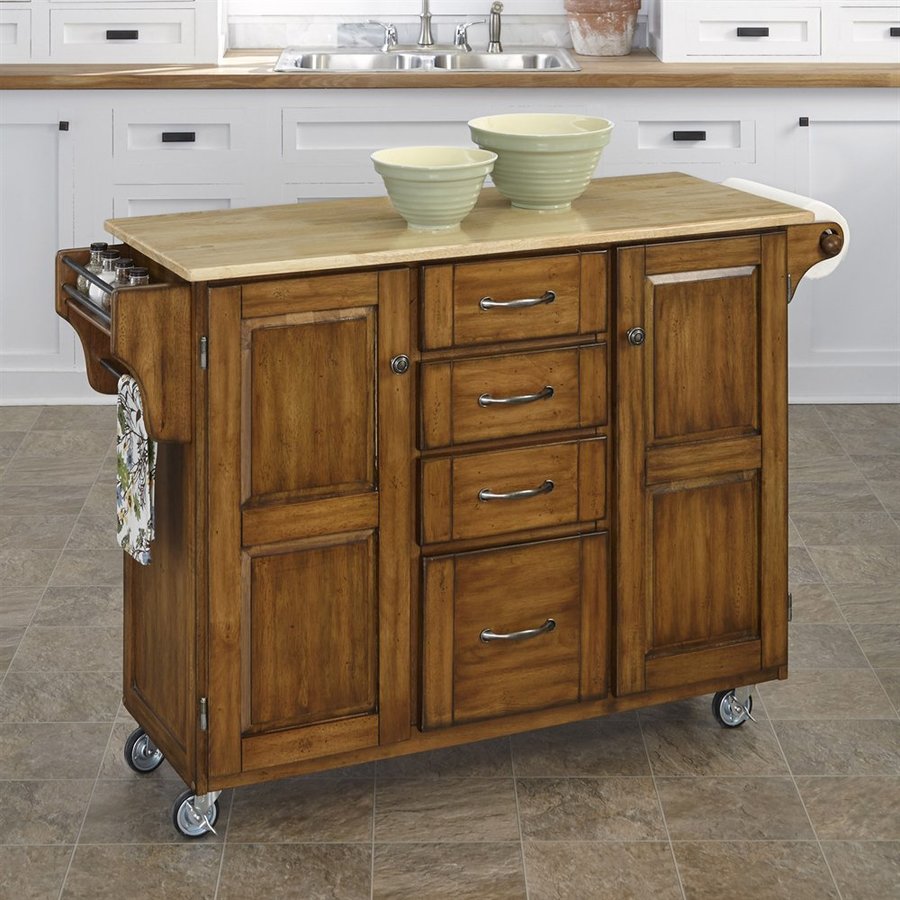 Home Styles 52.5 in L x 18 in W x 35.75 in H Cottage Oak Kitchen Island with Casters