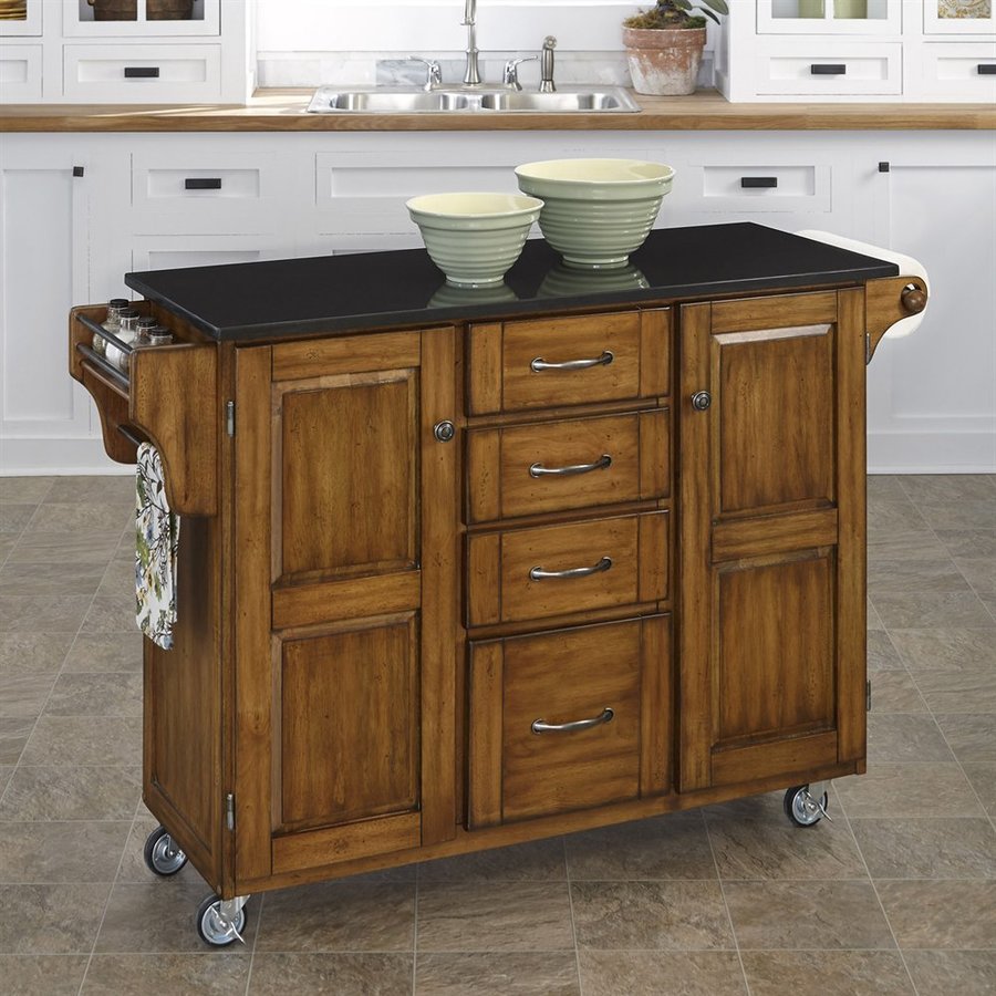 Home Styles 52.5 in L x 18 in W x 35.75 in H Cottage Oak Kitchen Island with Casters